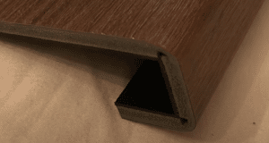 closeup of square ended bended vinyl flooring