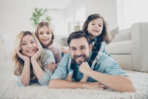 family enjoying their new carpet